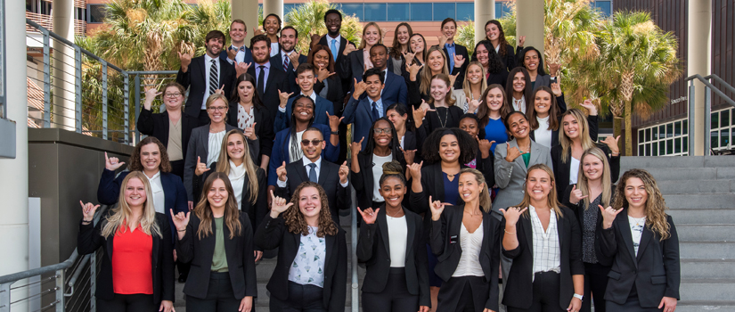 MHR cohort photographed on steps outside Moore School building.