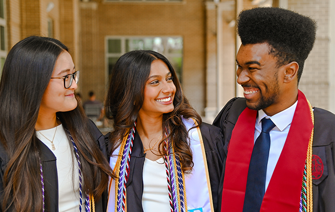 Arnold school graduates smiling